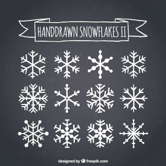 Hand drawn snowflakes on blackboard