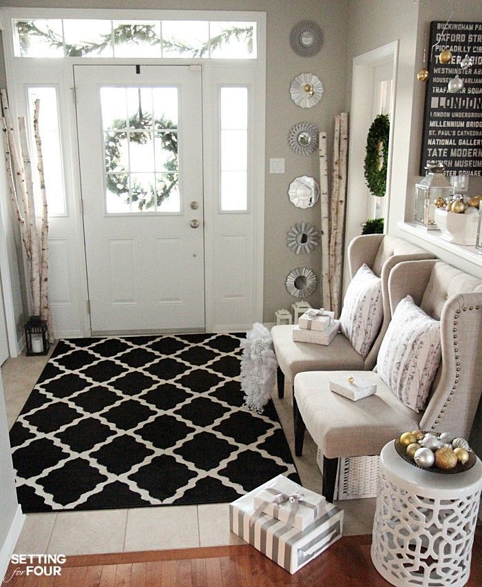 Holiday home decor ideas: How to decorate an Elegant and Neutral Christmas Foyer.