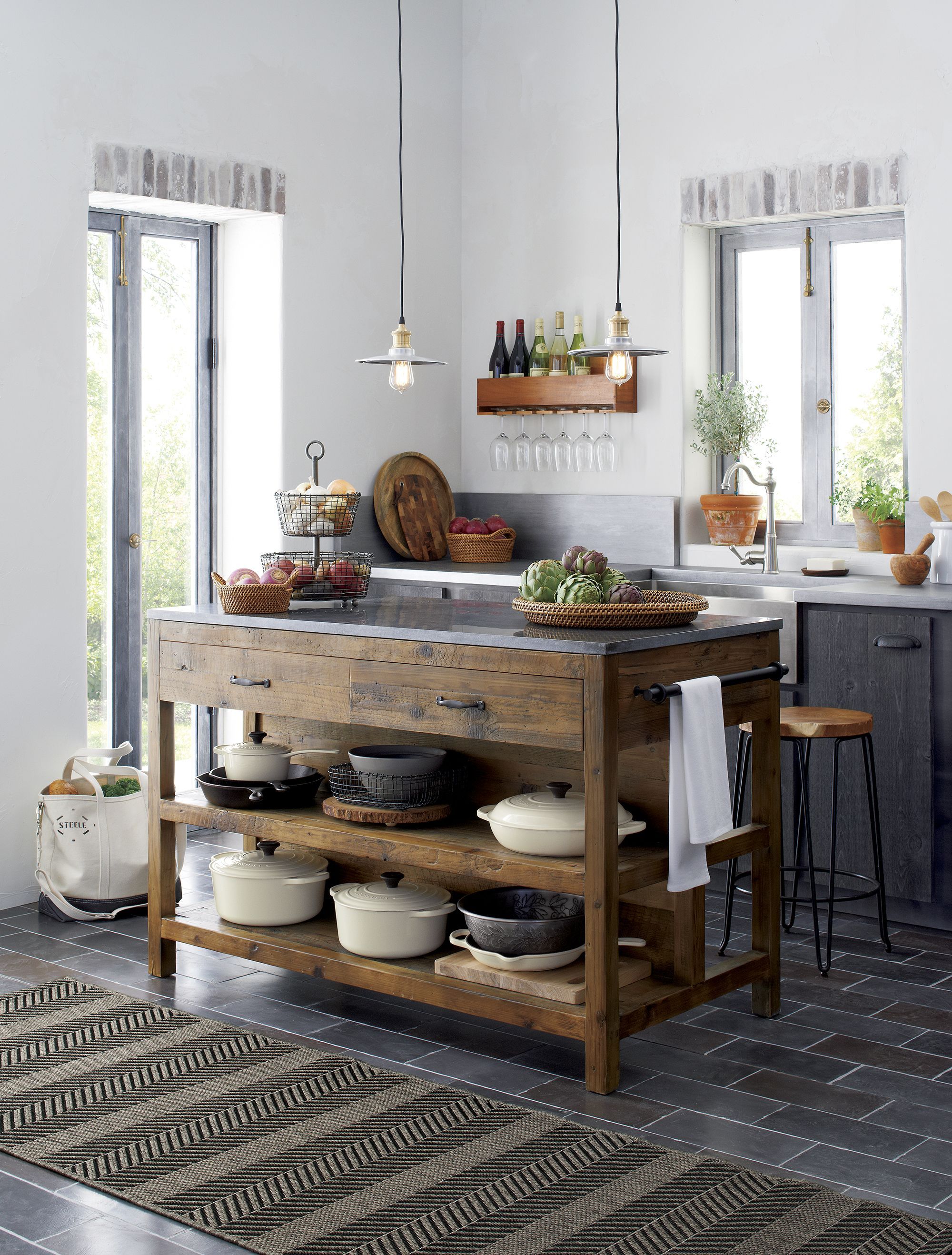 Like a treasured vintage find or a custom-designed piece, this elegant kitchen isl