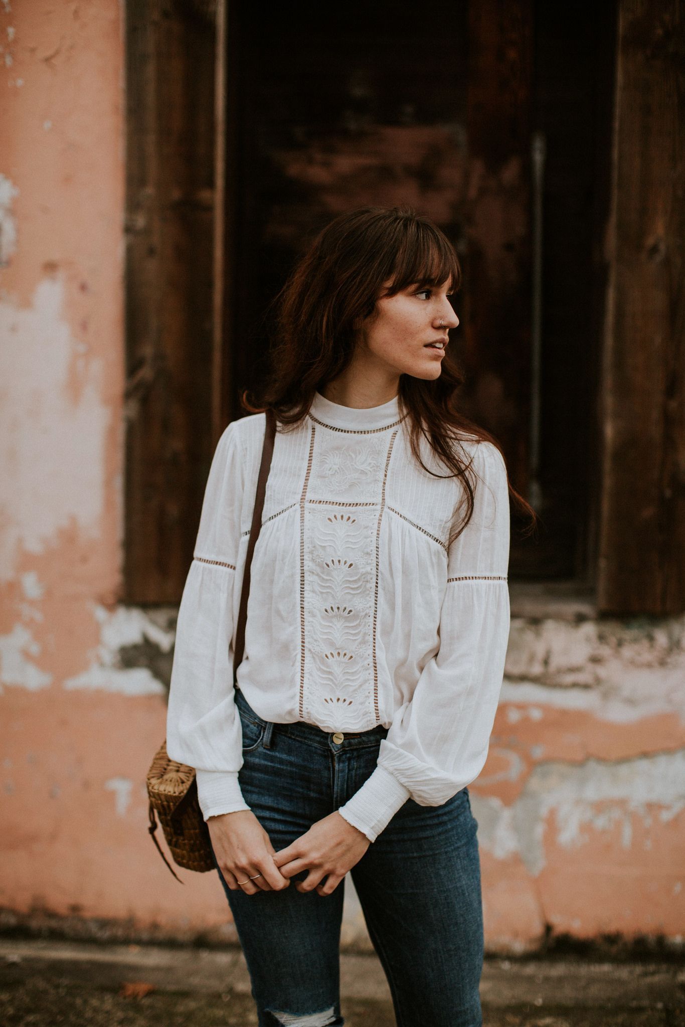 Lovely long-sleeved white blouse with feminine details.