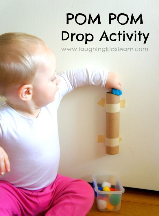 Pom pom drop activity for toddlers is great for developing fine motor skills and a