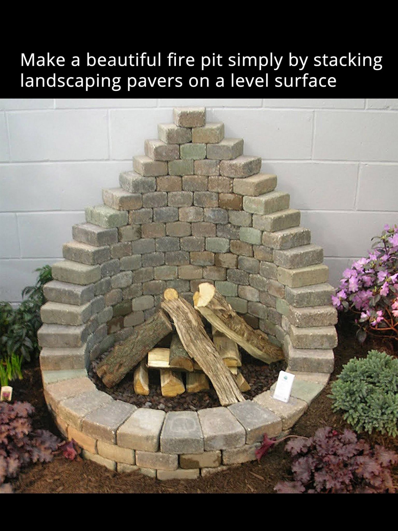 Simple stone fire pit using stone pavers. Relax in your own back yard!