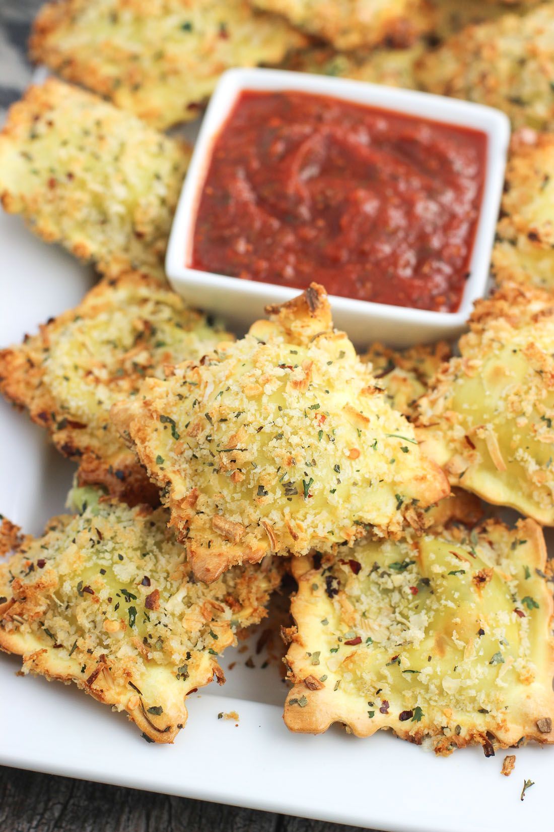 This easy recipe for crispy and baked toasted ravioli is a favorite! Ravioli is co