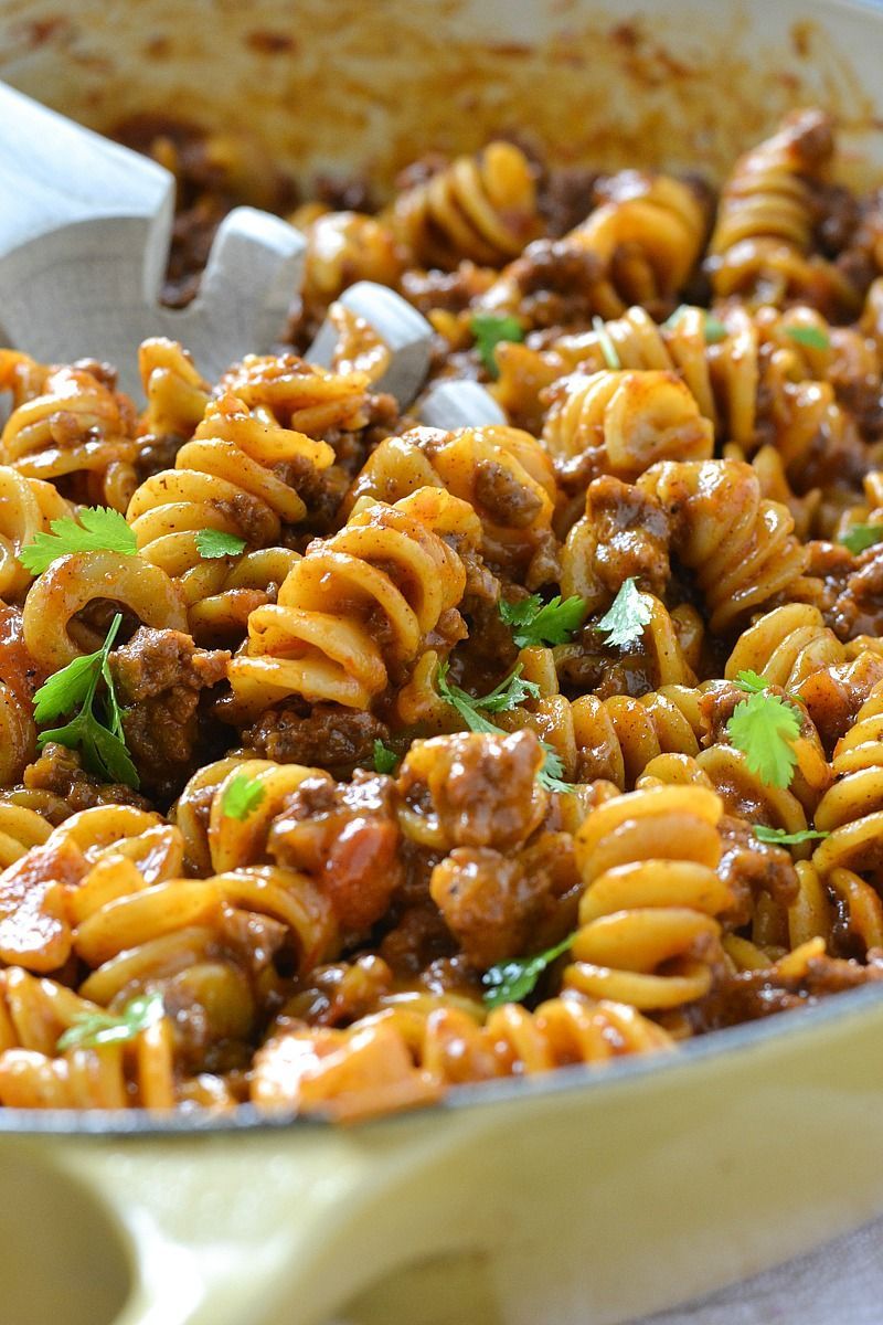 An easy and delicious recipe for One-Pot Cheesy Taco Pasta loaded with ground beef
