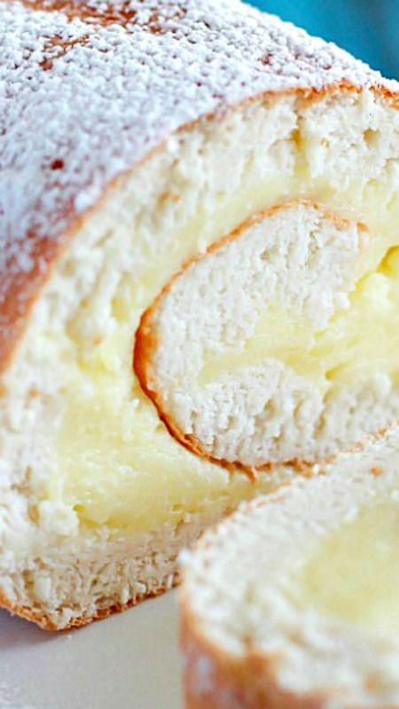 Creamy Lemon Angel Cake Roll ~ A light & delicious angel cake roll filled with creamy lemon custard.