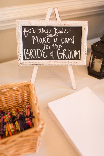 Kids table idea – crayons + paper to make a card for the bride + groom {Amber Rhodes Photography}