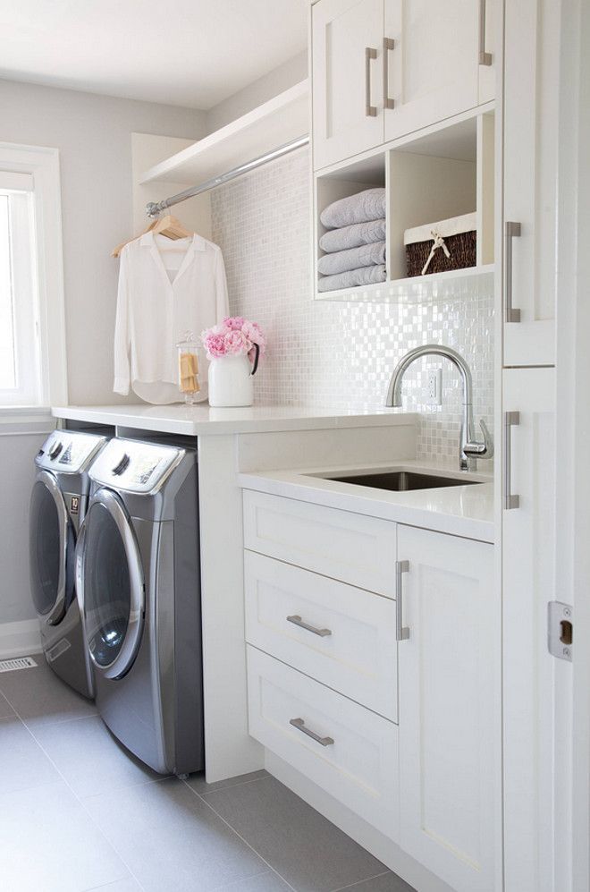 Laundry room. So much to like here from the cabinetry to the backsplash tile.