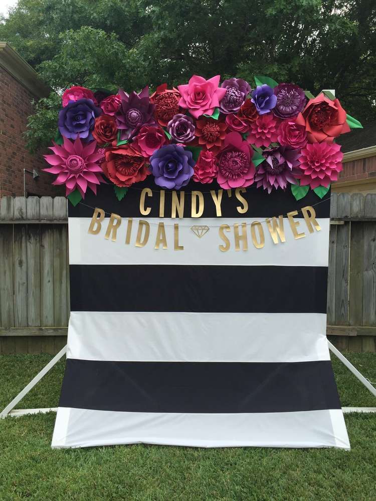 Lovely floral backdrop at a bridal shower party! See more party ideas at CatchMyParty.com!