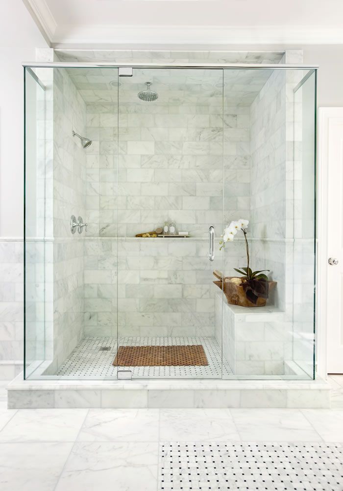 Pretty marble bathroom tile with glass door