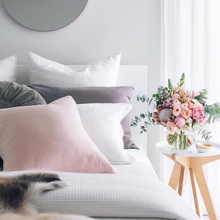 A pretty white, pink and pale grey palette for a feminine bedroom