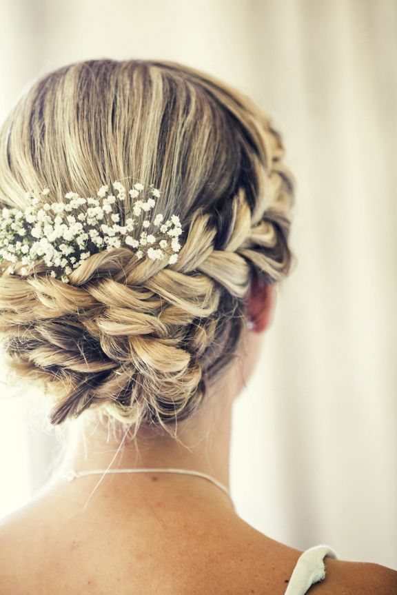 Beautiful Wedding Updo with a braid and babys breath