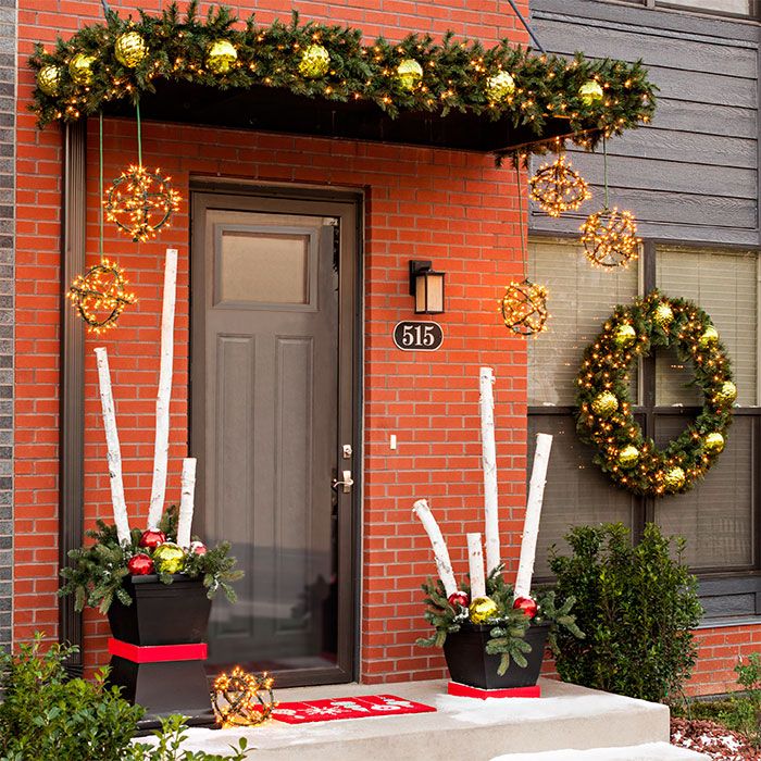 Contemporary front entry with classic Christmas decorations. -   Door Decoration Ideas
