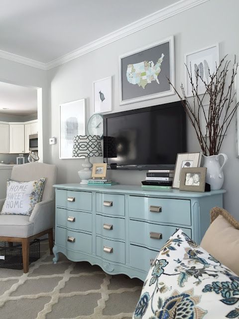 Love this dresser in the living room for storage – In Willows house it could go on the wall left of fireplace.