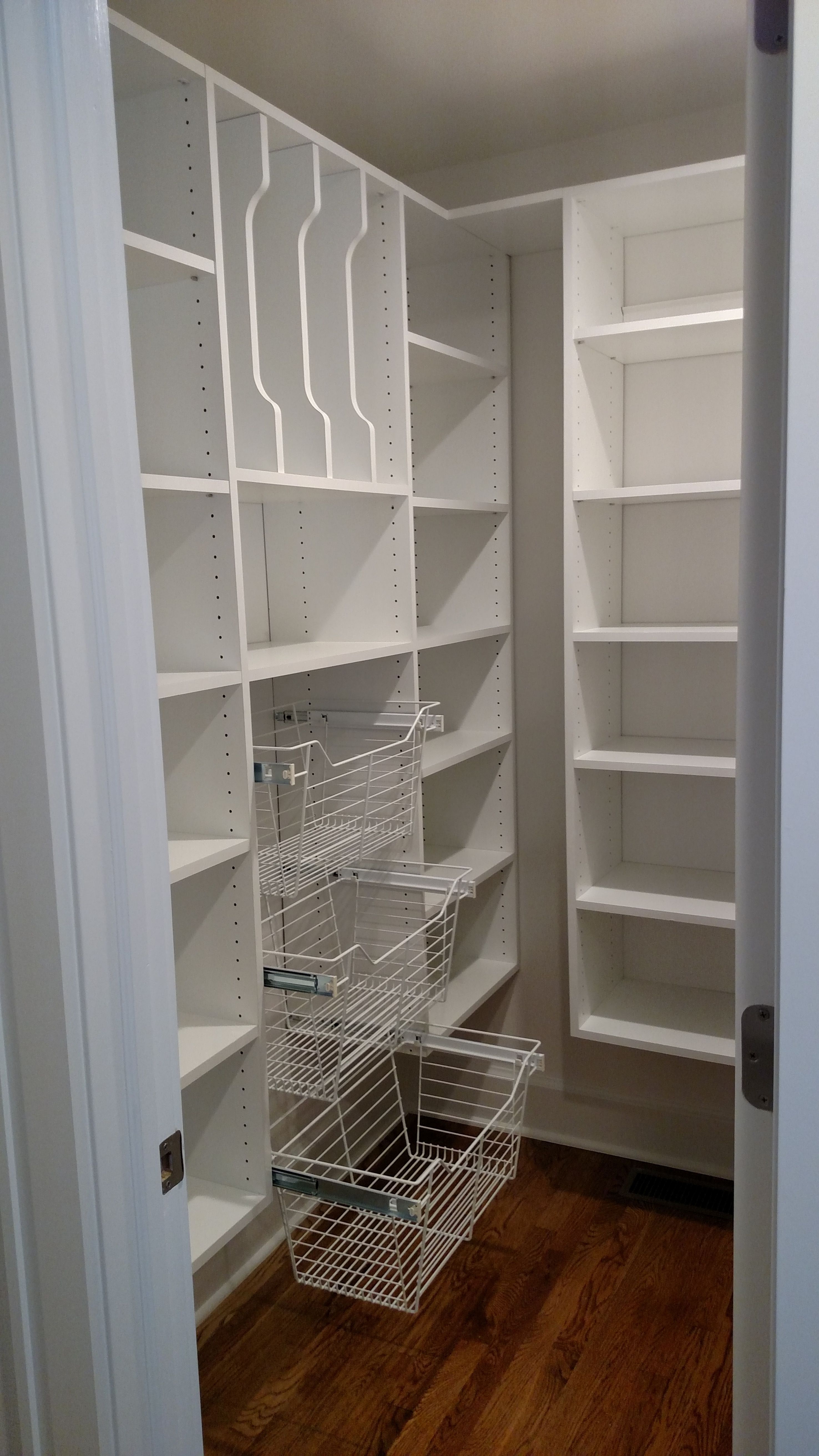 Walk in pantry! Pull out baskets, tray divider, adjustable shelves.