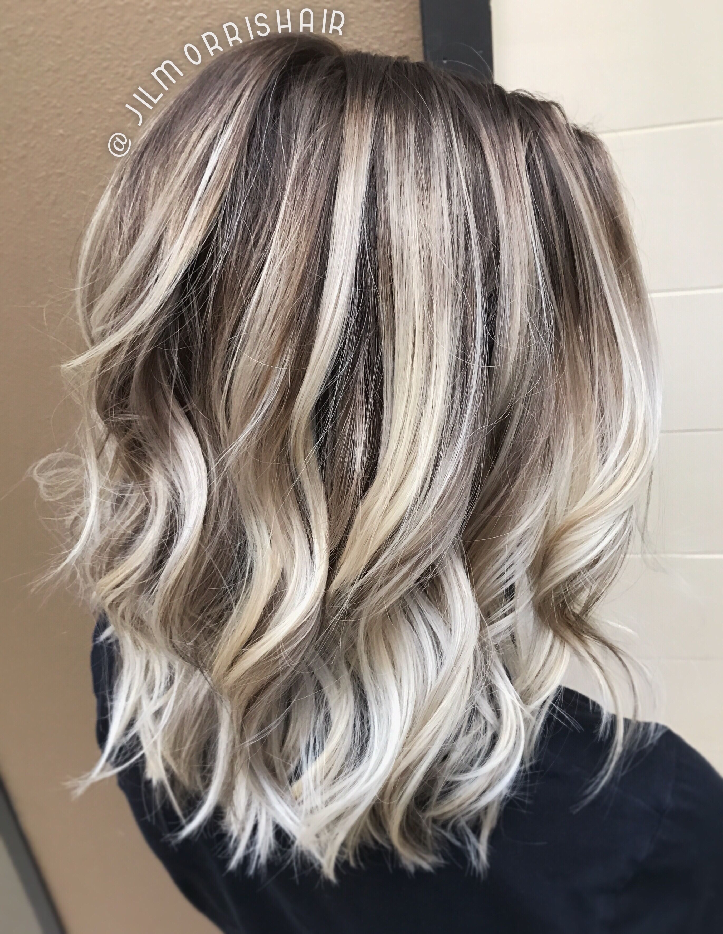 Cool icy ashy blonde balayage highlights, shadow root, waves and curls, blonde hair