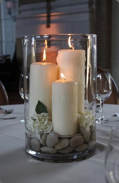 Inspiration for a tablesetting — and a substitute for pricey vase filler. Go outdoors and find some stones!