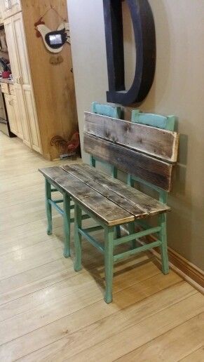 Rustic bench painted and distressed in aqua. Made from old chairs.