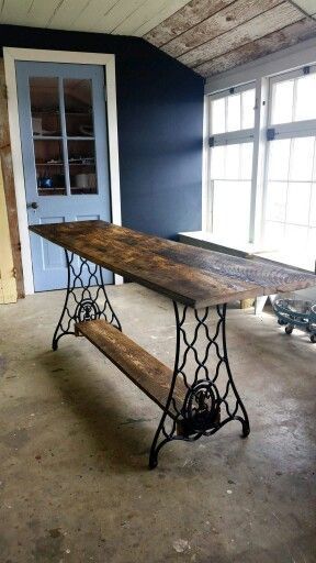 Table from reclaimed barnwood and base of Singer sewing machine. Made by Resurrected Goods. Follow us on Facebook!