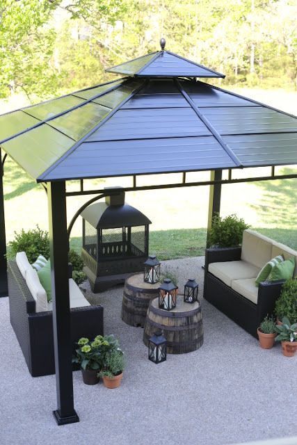 Anchor your outdoor space with a gazebo that provides shelter for a comfortable seating area and cozy fireplace. Groupings of