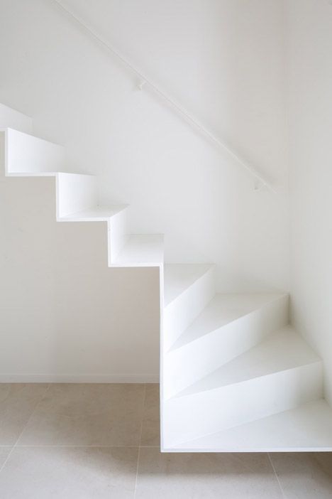 / Delicate staircase leads to attic extension by Five AM