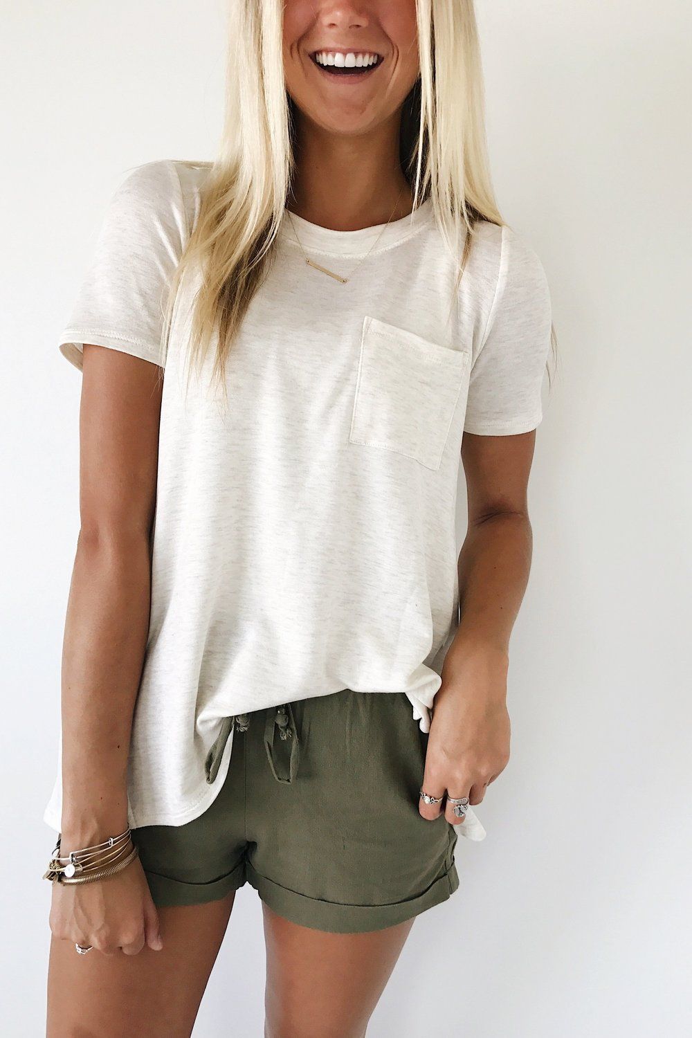 Oatmeal Heathered Top  Front Pocket  Mini Side Slits  Loose Fit  Also available in Heather Blue