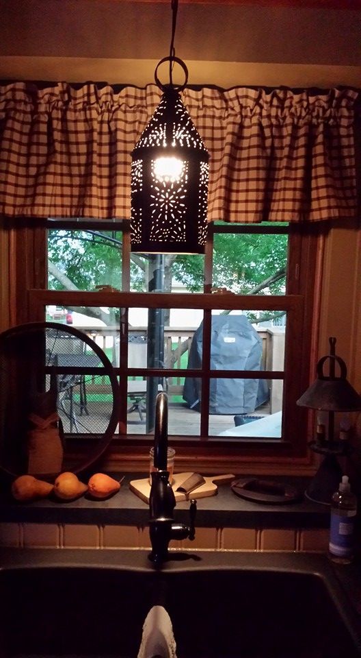 Primitive lighting, faucet, curtains