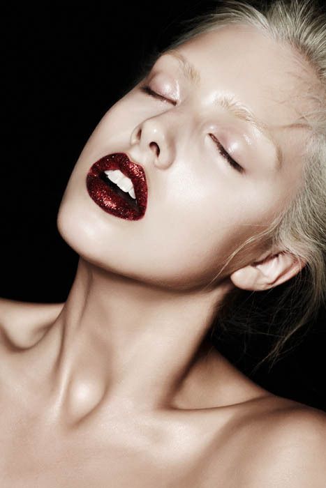Shine like the rockstar you are in hot red glitter lips and make a dramatic entrance to your next holiday party.