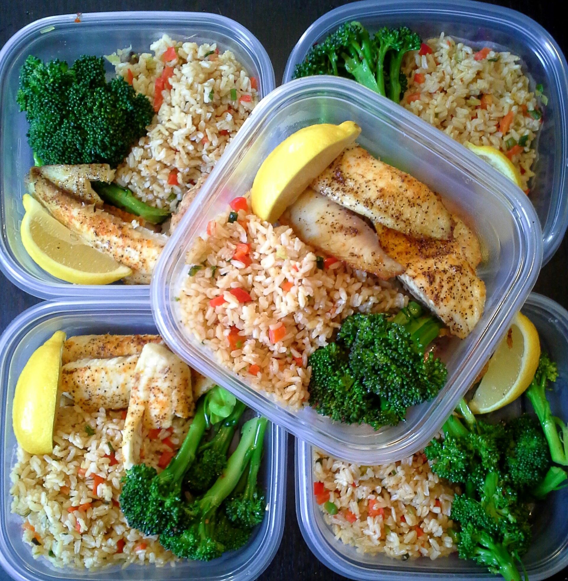 Simple and colorful meal prep! Baked, lemon tilapia with steamed broccoli and brown rice with sauteed peppers and green onions.