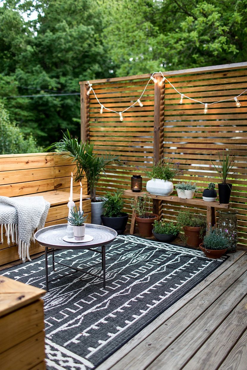 Small outdoor spaces suffer the same fate as indoor rooms— where to put all the clutter? Outdoor furniture cushions, lamps, and