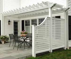 white patio pergola with privacy panels