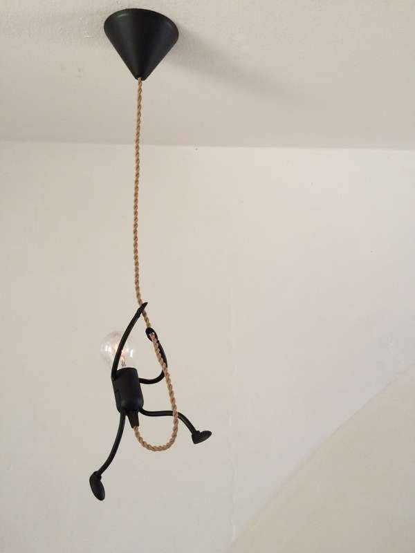 DIY Funny Stick Figure Hanging Light: great fir any kids room, industrial  decor or someone with a sense of humor. Super cute!!
