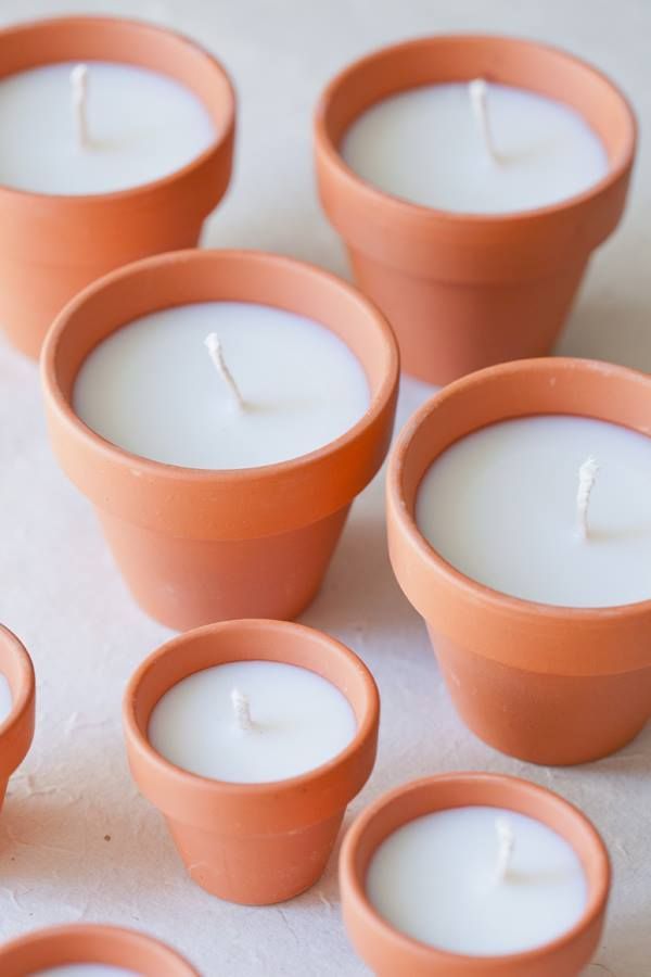 diy terracotta votive candles    Add a beautiful glow to an outdoor area with these charming DIY terracotta votives! They make