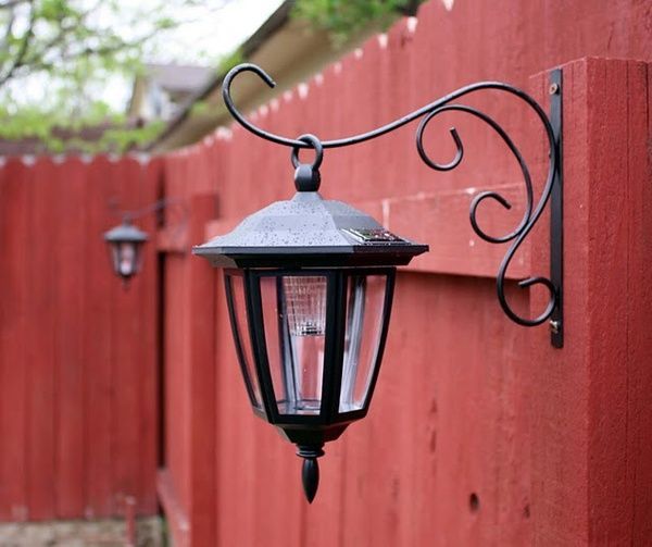 ..Dollar store solar lights on plant hook – LOVE this idea. Back yard gardening