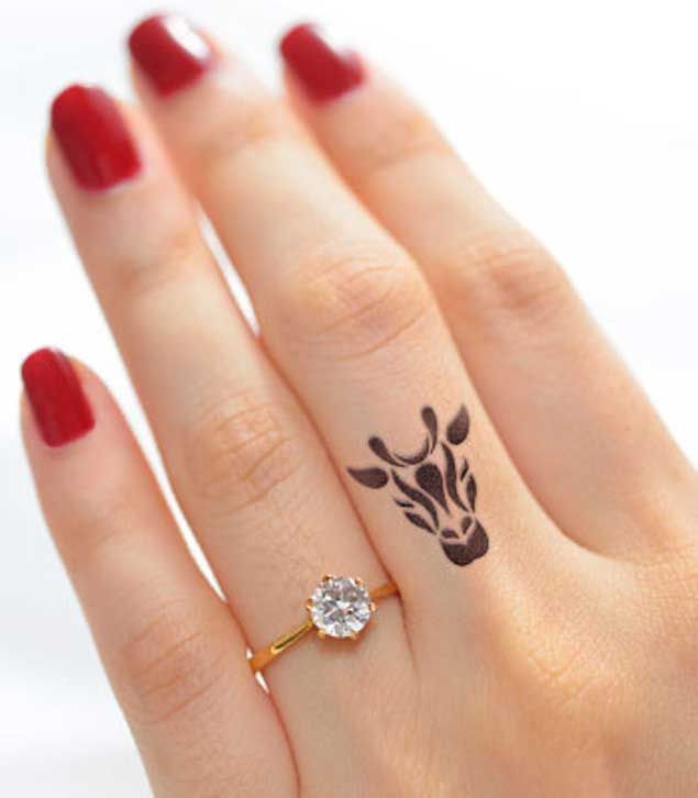 Elegant finger tattoos