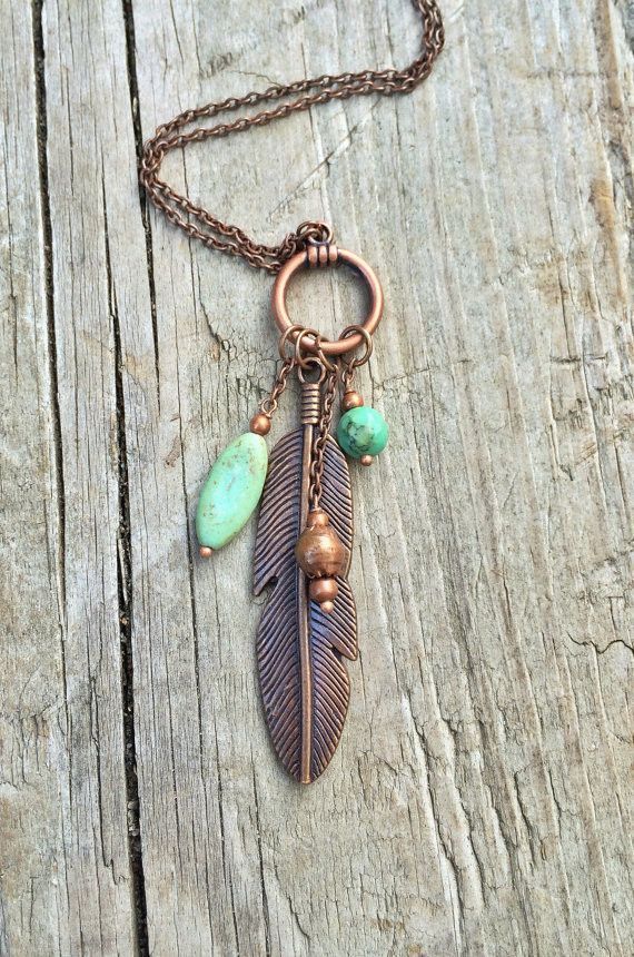 Long, adjustable feather and turquoise copper necklace. This necklace may be worn long (32″) or doubled with a toggle clasp (16″).