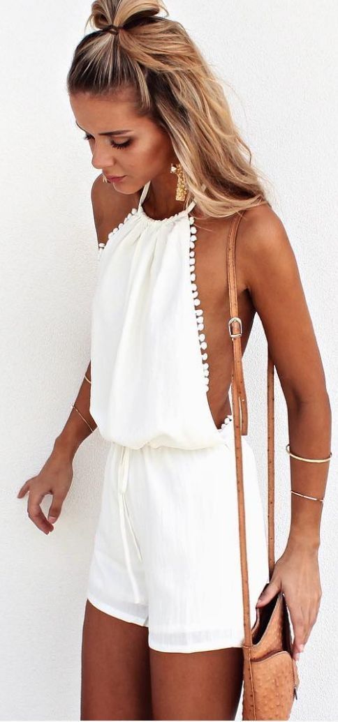 Love everything about this boho outfit.The white play suit, the classic jewelry and the simple hair!