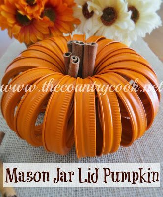 Mason Jar Lid Pumpkin. This super simple project is made of just mason jar lids, some spray paint, a little string to hold it