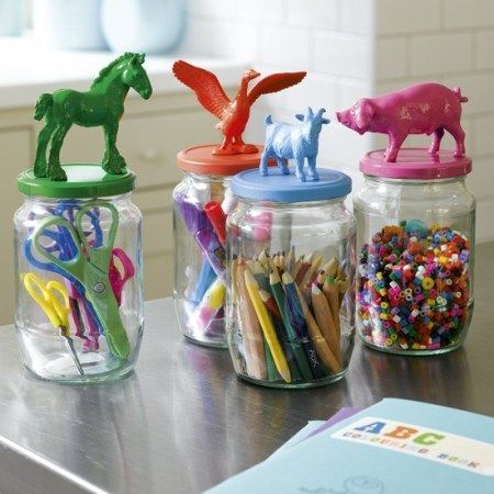 Organise a crafts cupboard with glass jars | 10 best kids playroom storage ideas | childrens room ideas | design inspiration |