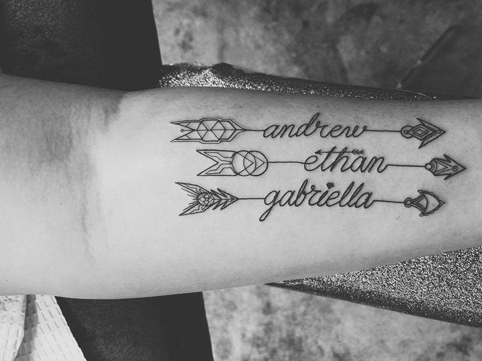 Tattoo ideas for parents | Name and arrow tattoo on Yvonne V.