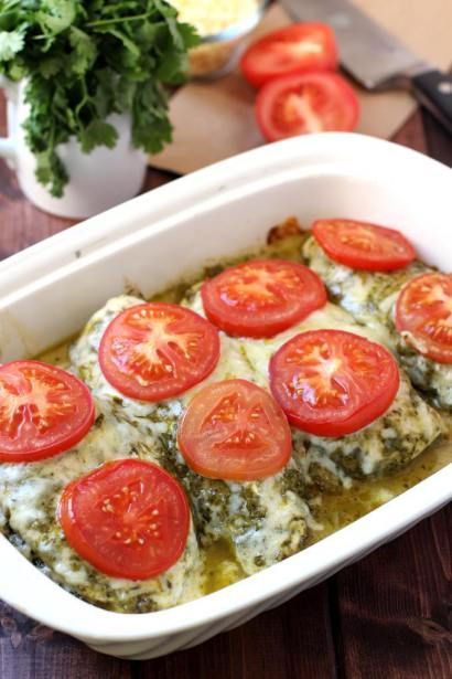 This Chicken Pesto Bake showcases whole-food ingredients at their finest. Chicken breasts rubbed with basil-pesto and topped with