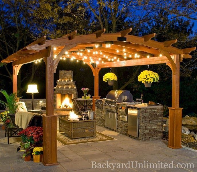 A pergola must have lights: inspiration dream-pergola + fireplace. Backyard  dining at its finest :)