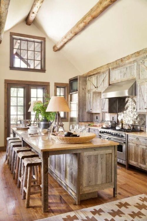 Beautiful. Love everything about this kitchen. Color scheme and Fixtures and Decor. Vaulted ceilings with wooden beams.