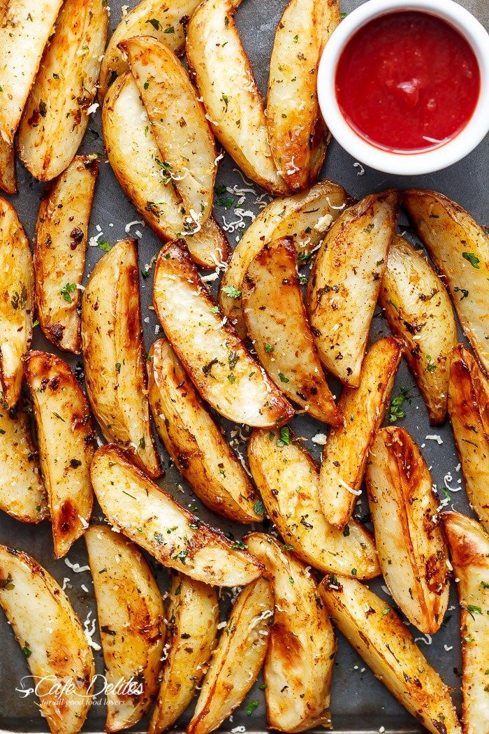 Crispy Garlic Baked Potato Wedges are soft pillows on the inside, and crunchy on the outside with a good kick of garlic and