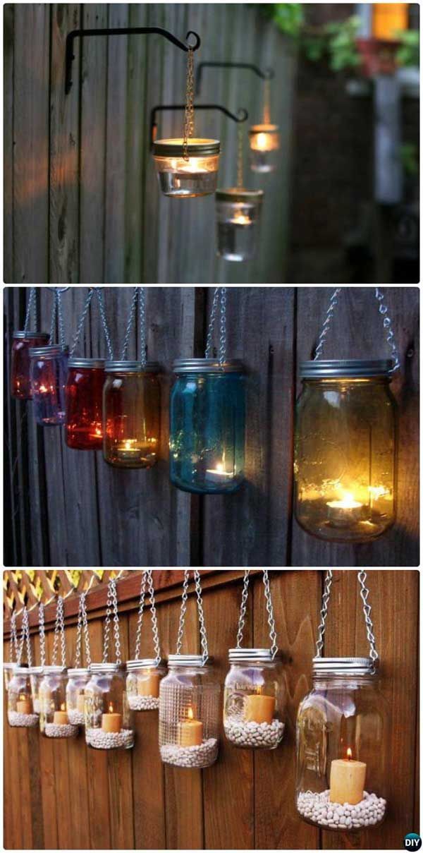 Decorate your garden fence with these DIY hanging mason jar lights.