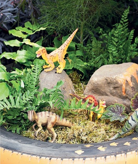 Dinosaur garden for our little ones. Add rocks, moss, ferns, maybe even a volcano!