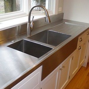 Farmhouse inspired kitchen work surface. Stainless steel counter top with integrated sink and drain board! #diy_kitchen_worktop