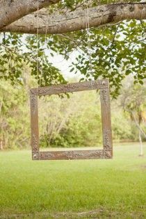 Hang a frame for people to take photos in. So fun for a backyard party! #contest