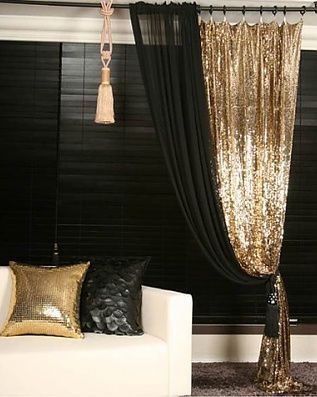 Not necessarily this exact thing…but I love the idea of black and gold for a theater room