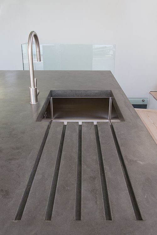 polished concrete work top with drainer grooves