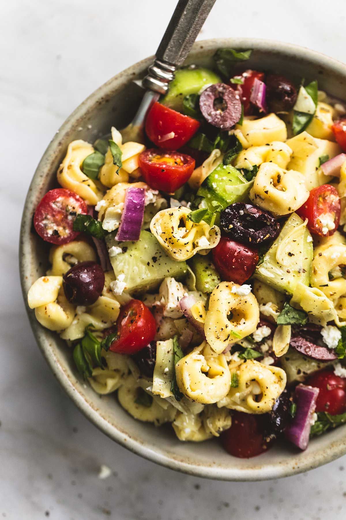 Quick and easy Greek Tortellini Pasta Salad with zesty Greek lemon dressing, fresh veggies, and hearty tortellini pasta. |